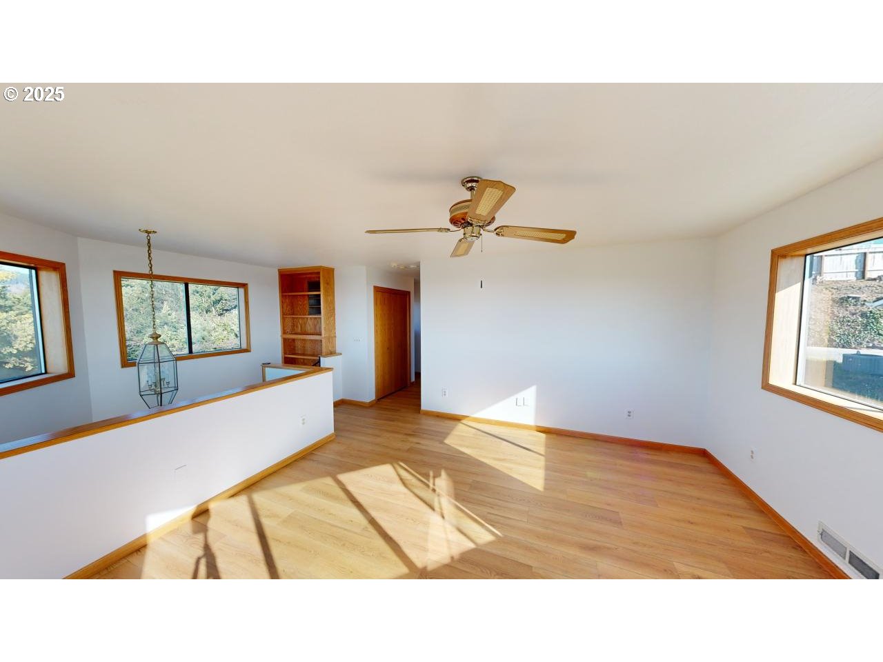 16151 Lower Harbor Road Brookings, OR 97415 - Photo 19 of 43 a open kitchen view with wooden floor and windows