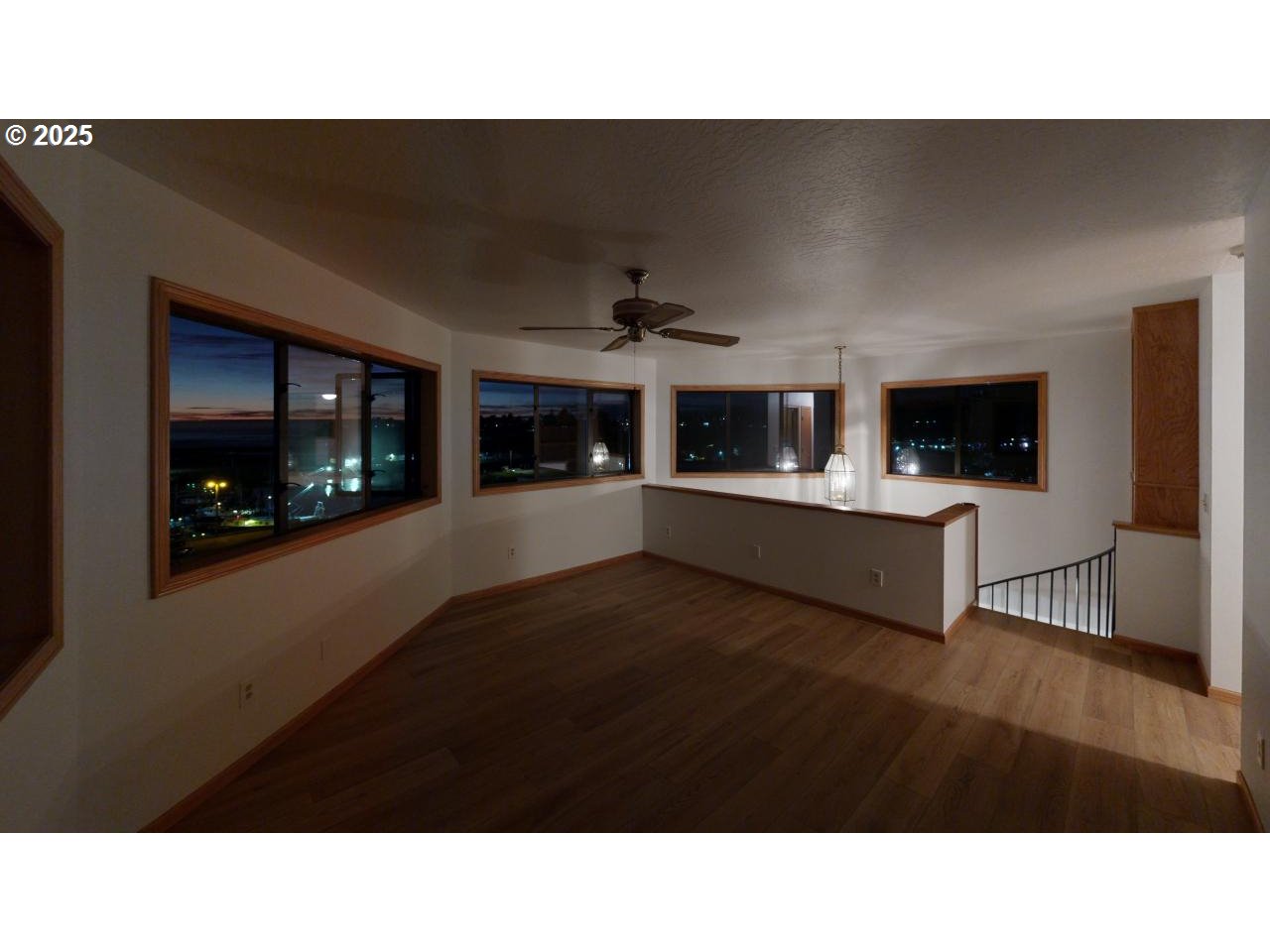 16151 Lower Harbor Road Brookings, OR 97415 - Photo 20 of 43 a open kitchen with stainless steel appliances kitchen area and hall with wooden floor