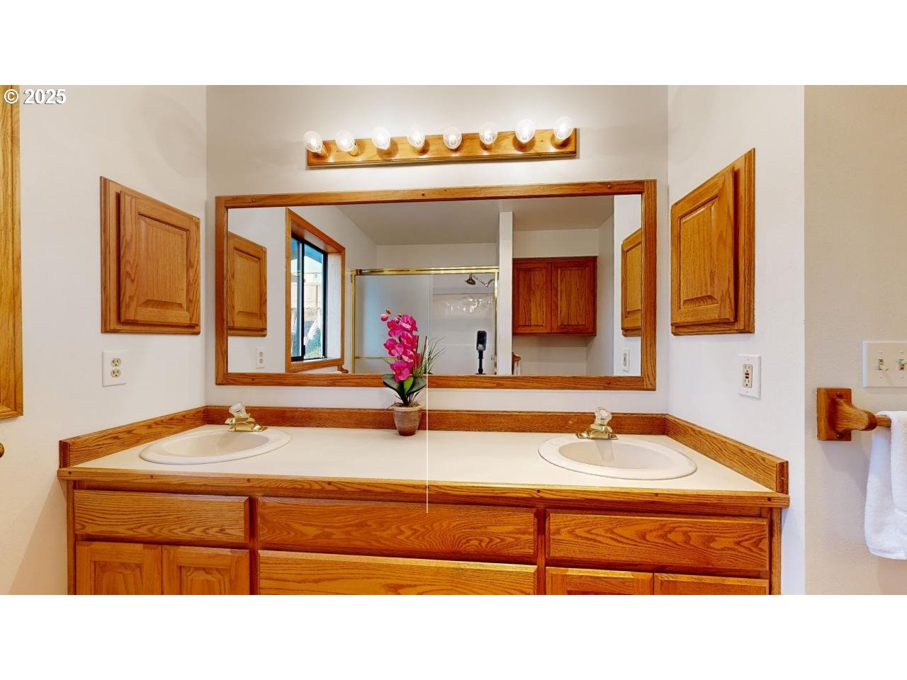 16151 Lower Harbor Road Brookings, OR 97415 - Photo 25 of 43 a bathroom with a sink and a mirror