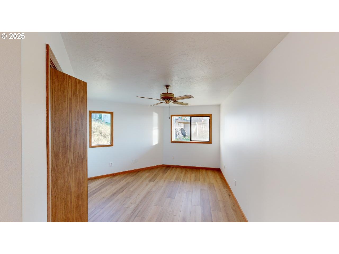 16151 Lower Harbor Road Brookings, OR 97415 - Photo 28 of 43 a bathroom with a sink and a window