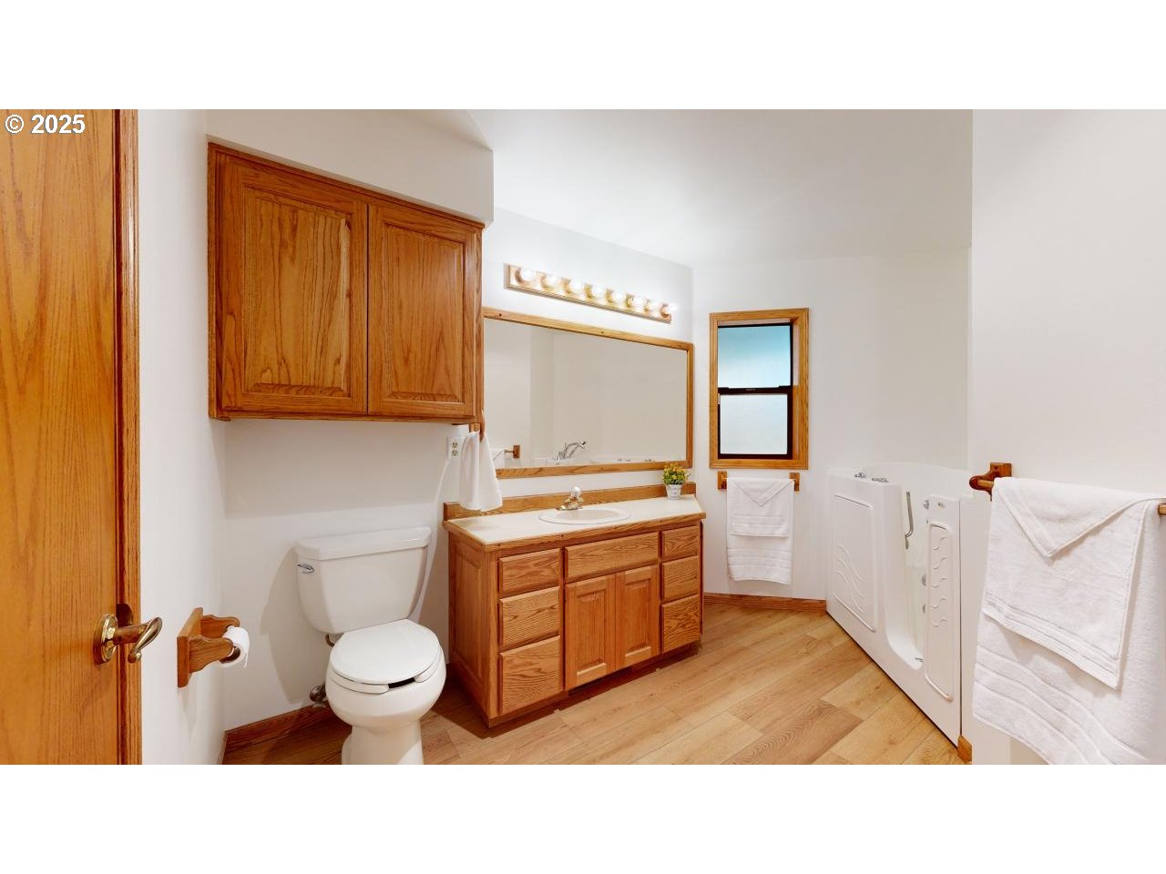 16151 Lower Harbor Road Brookings, OR 97415 - Photo 30 of 43 a bathroom with a sink a toilet and mirror