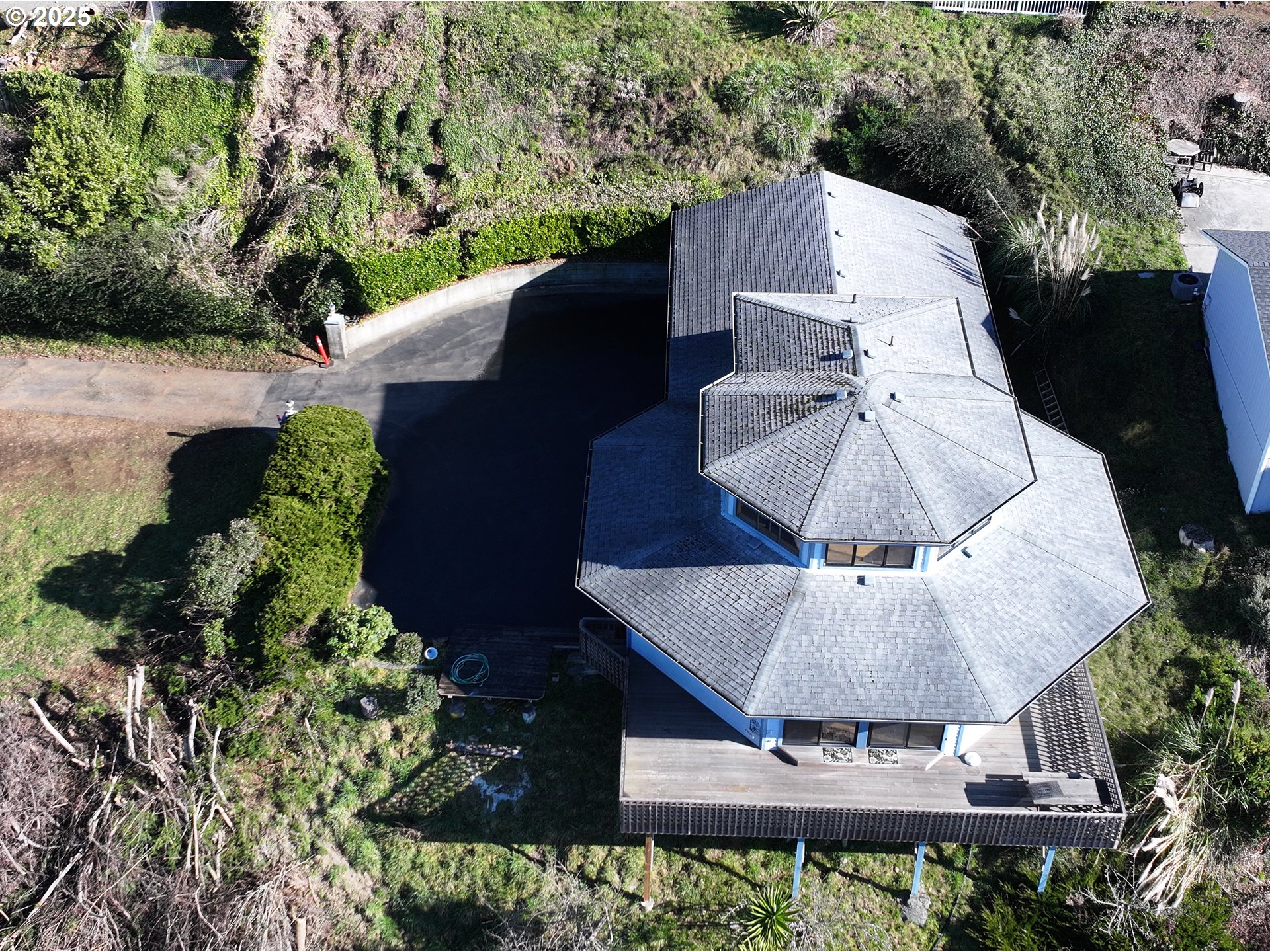 16151 Lower Harbor Road Brookings, OR 97415 - Photo 32 of 43 an aerial view of a house with yard swimming pool and outdoor seating