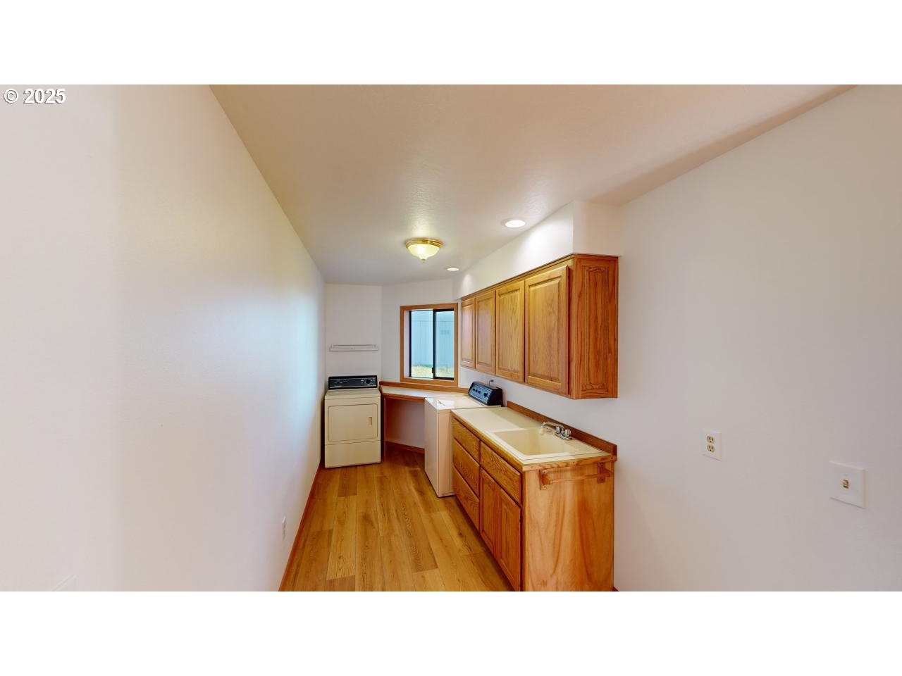 16151 Lower Harbor Road Brookings, OR 97415 - Photo 33 of 43 a bathroom with a sink and a mirror