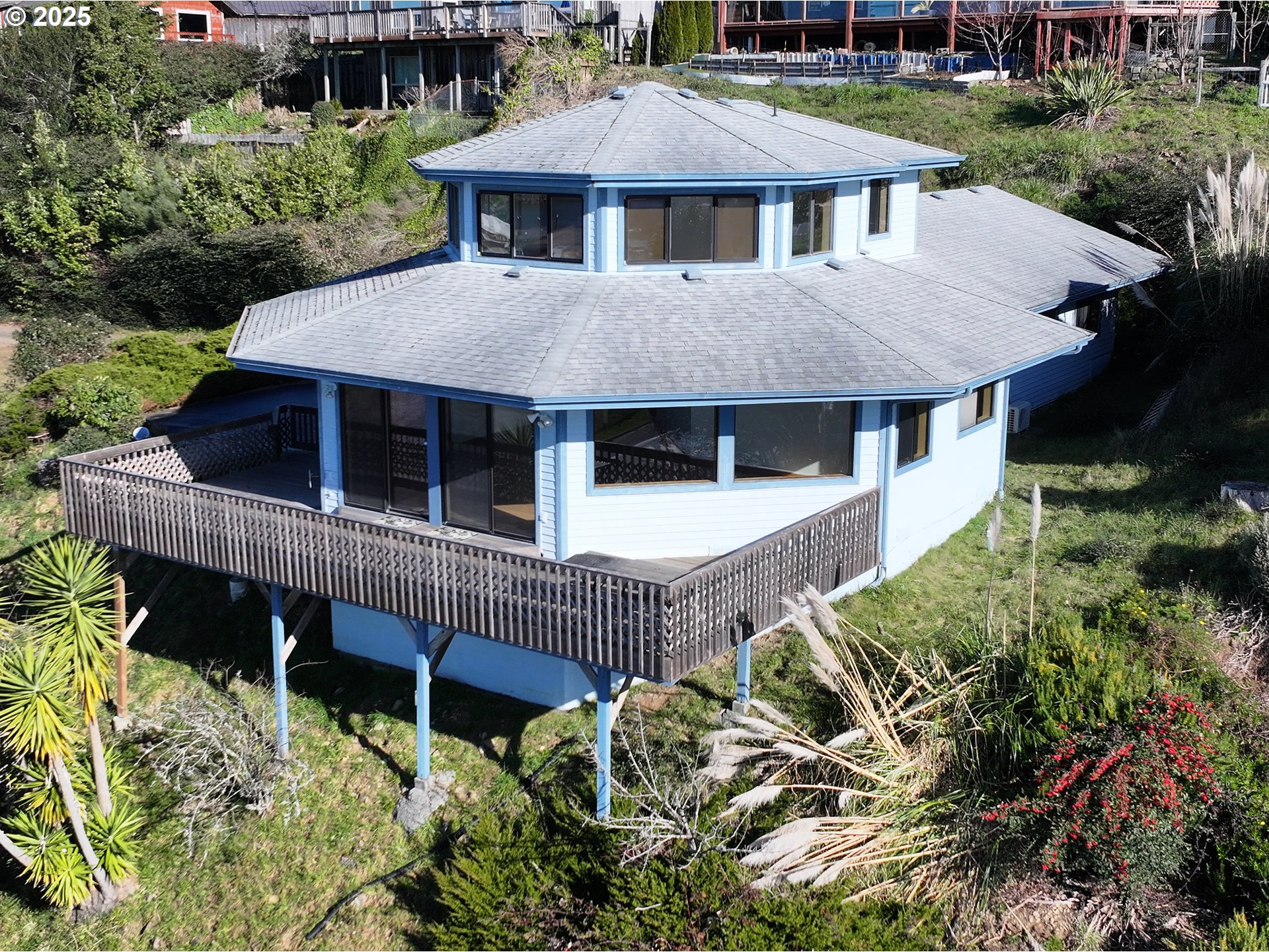 16151 Lower Harbor Road Brookings, OR 97415 - Photo 4 of 43 a aerial view of a house with a yard and potted plants