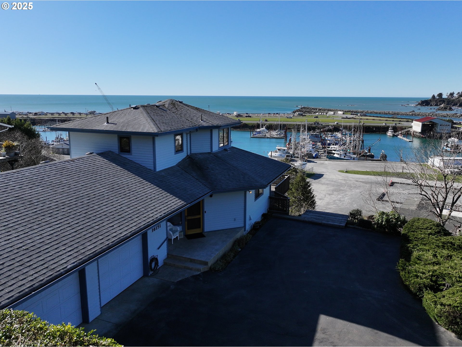 16151 Lower Harbor Road Brookings, OR 97415 - Photo 40 of 43 a terrace of a house with outdoor seating