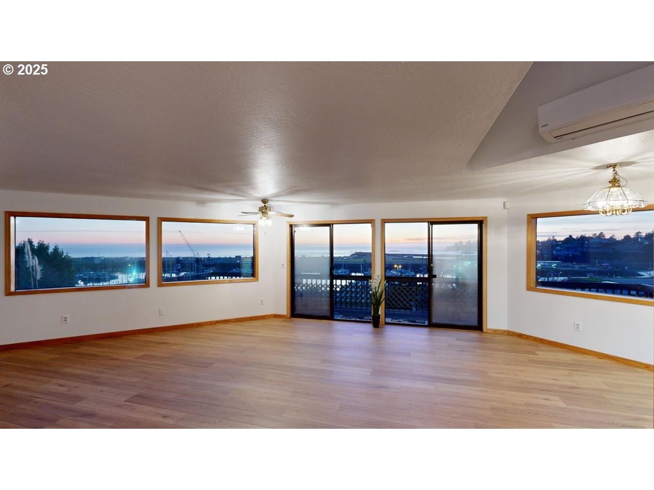 16151 Lower Harbor Road Brookings, OR 97415 - Photo 8 of 43 a room with furniture and a large window