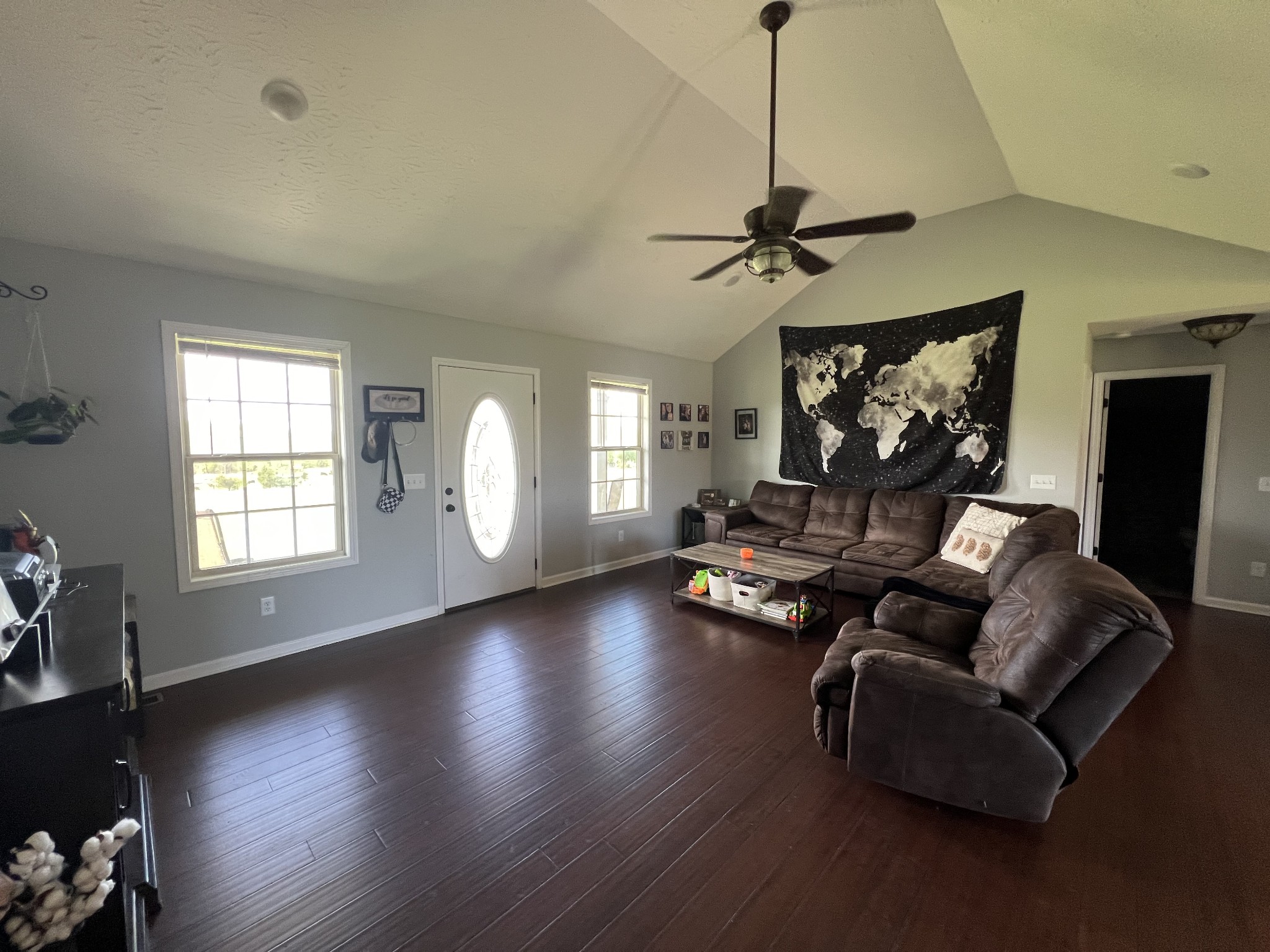1288 Mt Olive Road Westmoreland, TN 37186 - Photo 3 of 16 a living room with couches and a flat screen tv with kitchen view