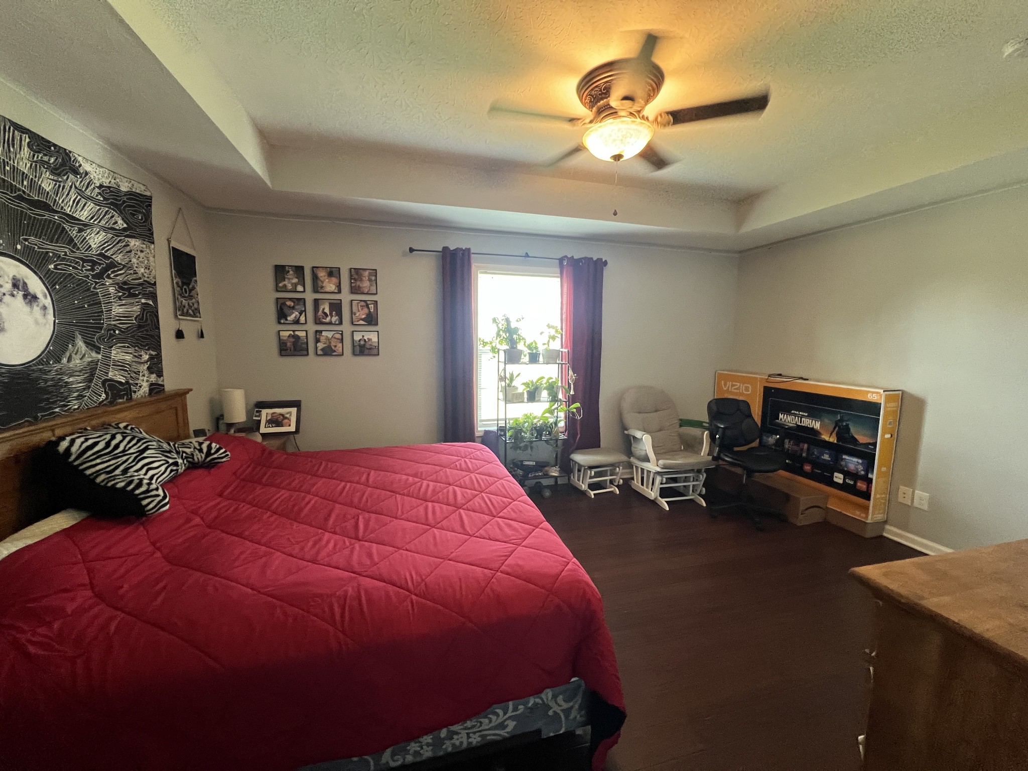 1288 Mt Olive Road Westmoreland, TN 37186 - Photo 10 of 16 a bed room with a bed and a chandelier