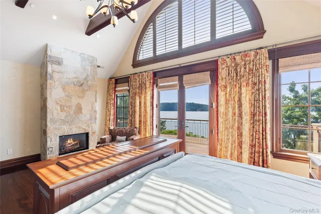 a view of balcony with wooden floor and fence