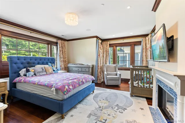 a bathroom with a sink toilet vanity and tub