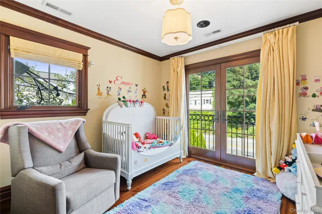 a kitchen with stainless steel appliances granite countertop a refrigerator a stove and a sink