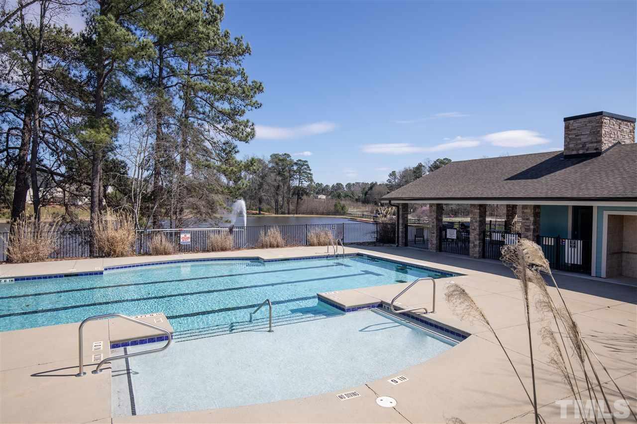 2441 Memory Ridge Drive Raleigh, NC 27606 - Photo 19 of 21 a view of house with outdoor seating