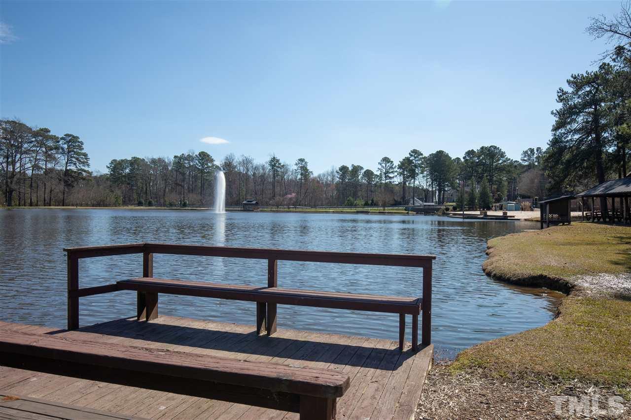 2441 Memory Ridge Drive Raleigh, NC 27606 - Photo 20 of 21 a view of a lake from a living room