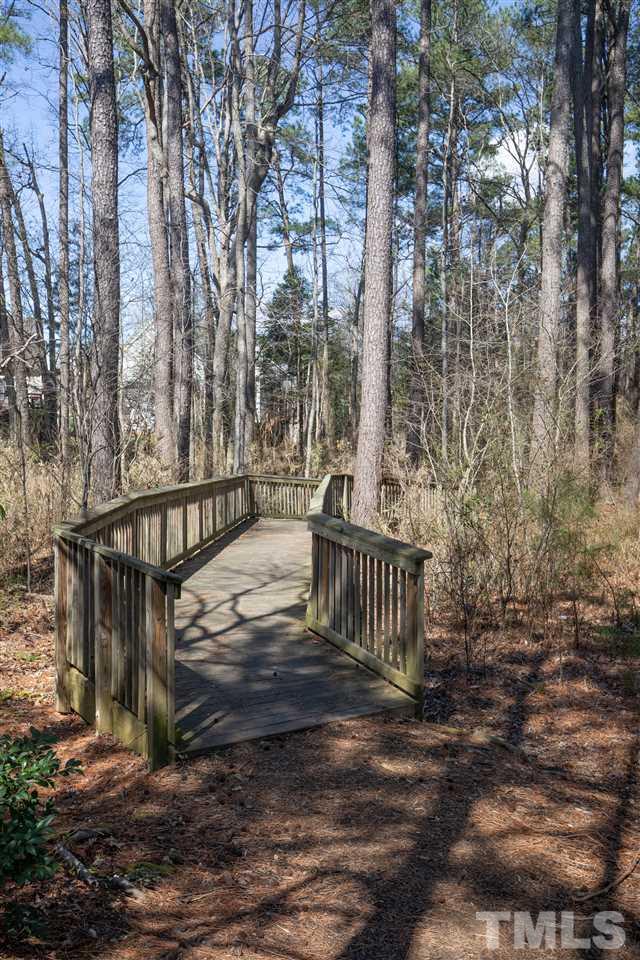 2441 Memory Ridge Drive Raleigh, NC 27606 - Photo 21 of 21 a view of balcony with wooden fence and floor
