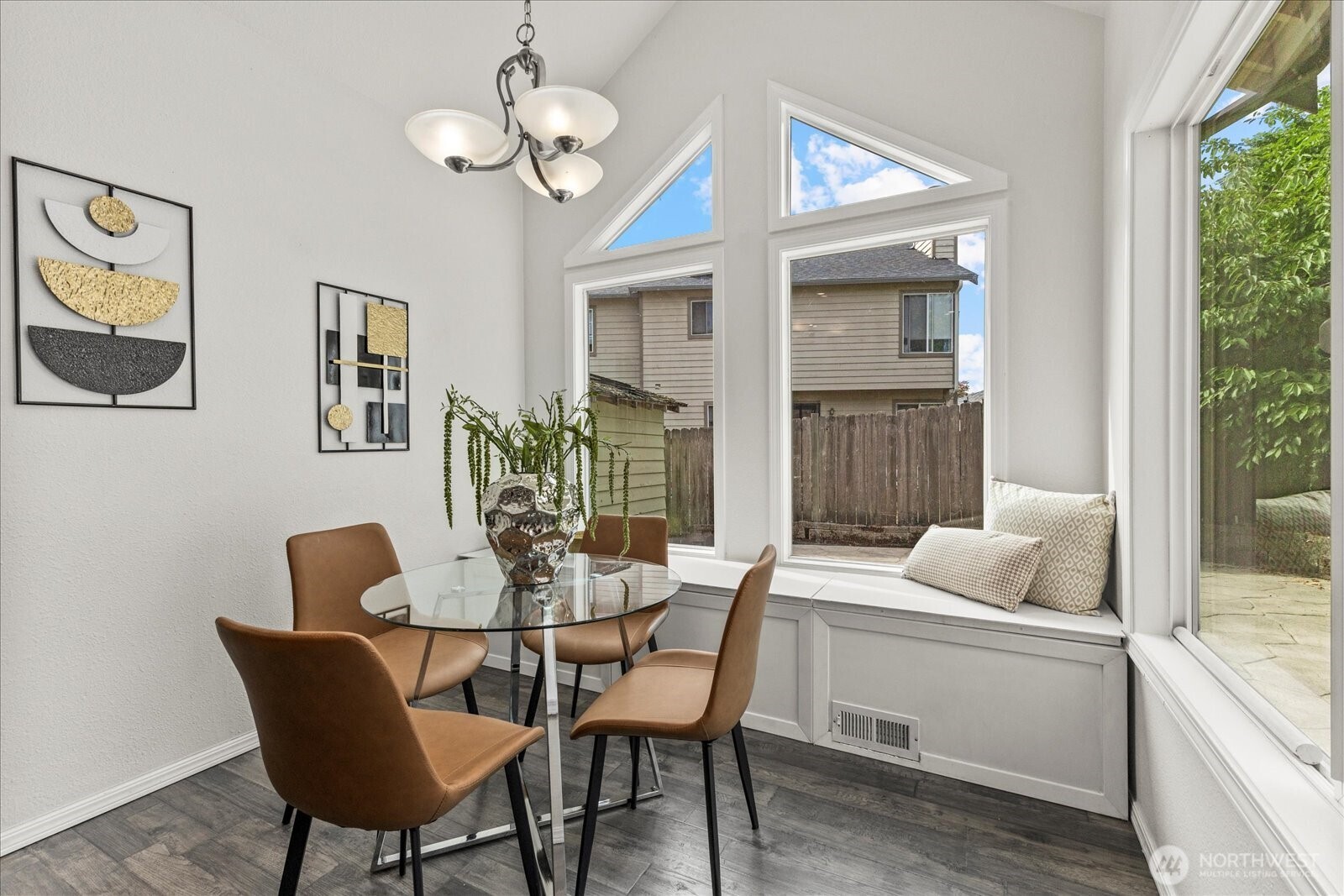 1027 Southwest 352nd Street Federal Way, WA 98023 - Photo 14 of 33 a dining room with furniture a window and a chandelier