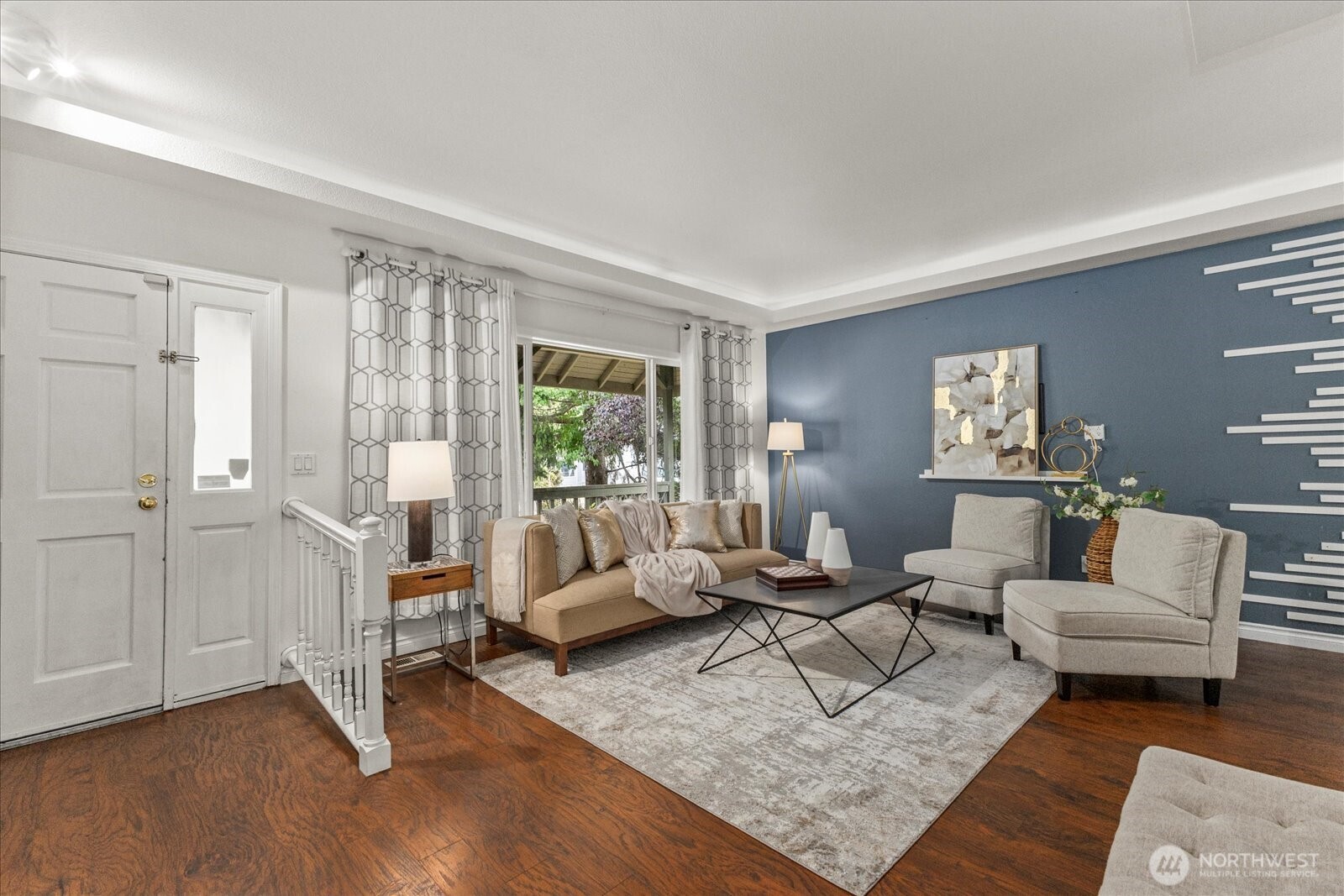 1027 Southwest 352nd Street Federal Way, WA 98023 - Photo 3 of 33 a living room with furniture and a wooden floor