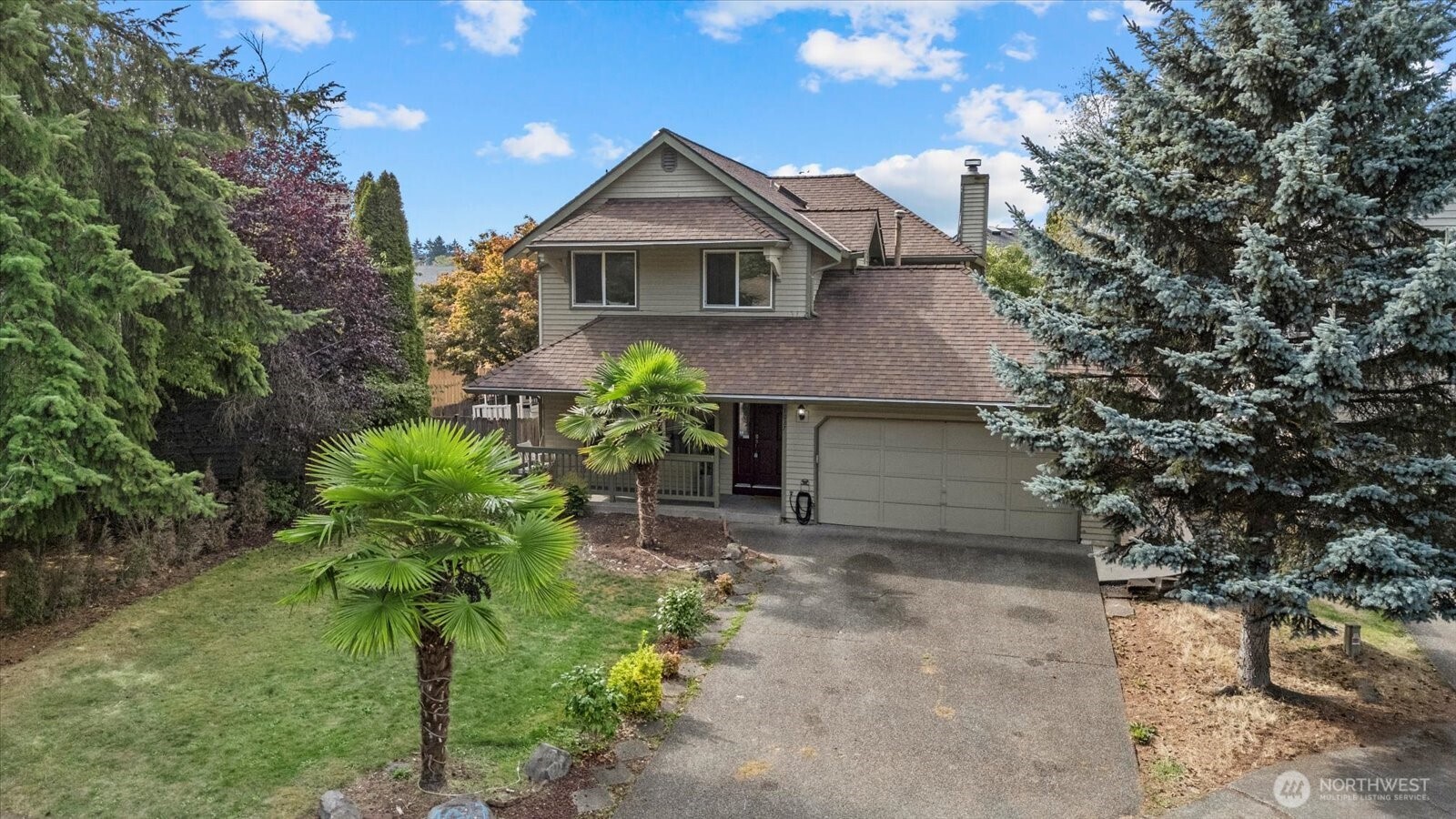 1027 Southwest 352nd Street Federal Way, WA 98023 - Photo 33 of 33 a front view of a house with a yard