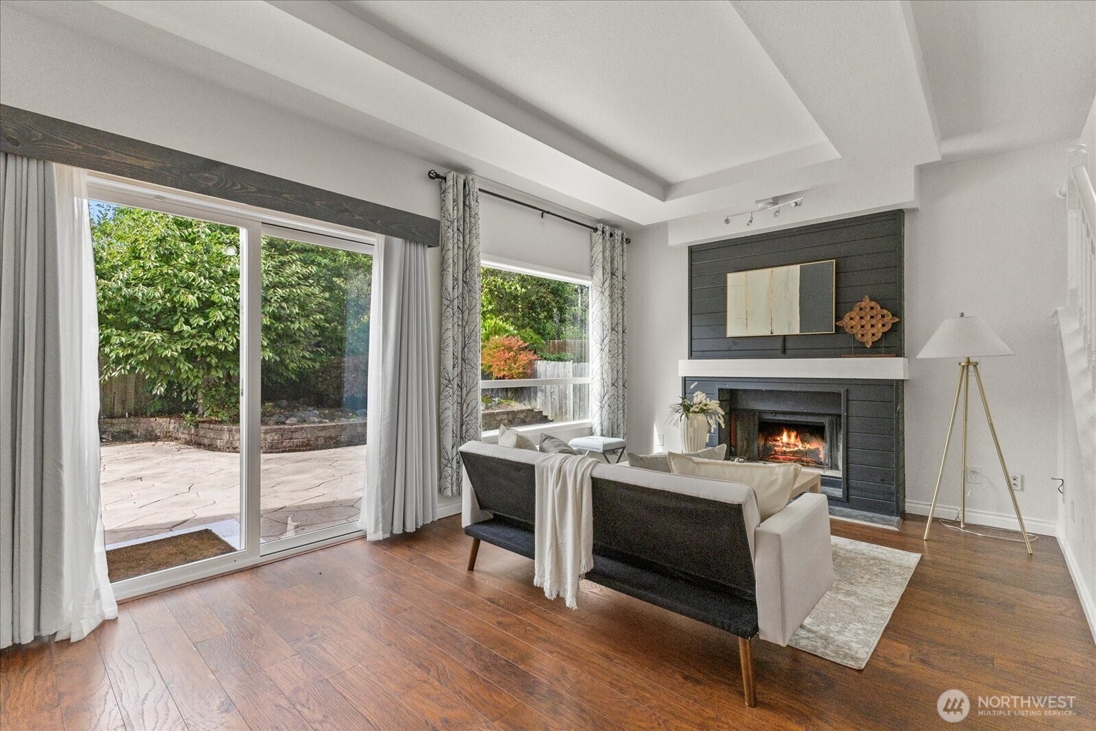 1027 Southwest 352nd Street Federal Way, WA 98023 - Photo 8 of 33 a living room with furniture and a fireplace