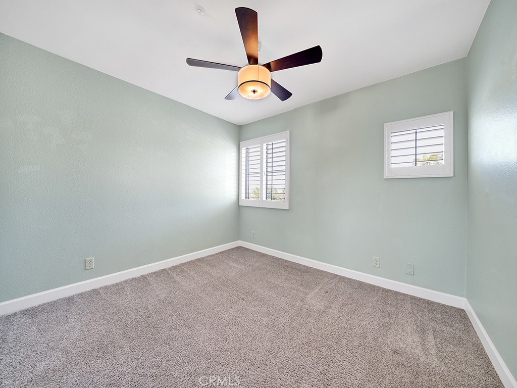 604 Via Espiritu San Clemente, CA 92672 - Photo 30 of 50 an empty room with a window and a ceiling fan