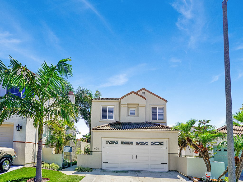 604 Via Espiritu San Clemente, CA 92672 - Photo 7 of 50 a front view of a house with a garden