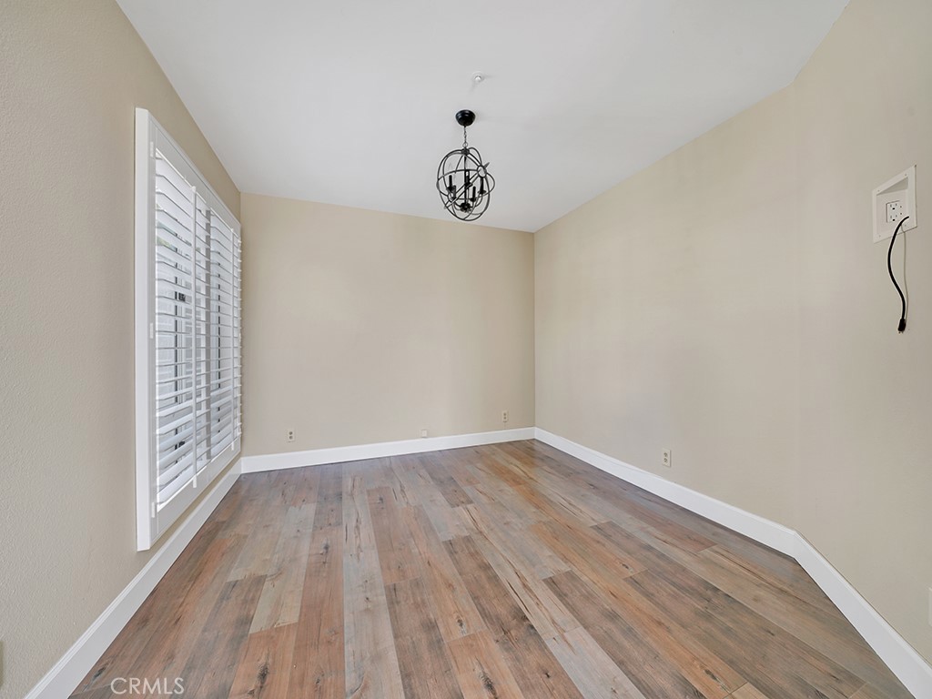 604 Via Espiritu San Clemente, CA 92672 - Photo 10 of 50 a view of a room with wooden floor and white walls