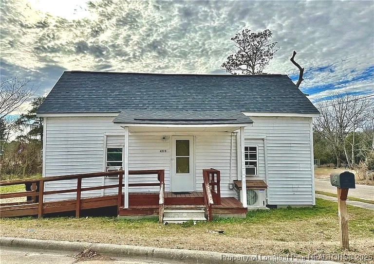 400 Daniel McLeod Road Red Springs, NC 28377 - Photo 1 of 12 a view of a house with a backyard