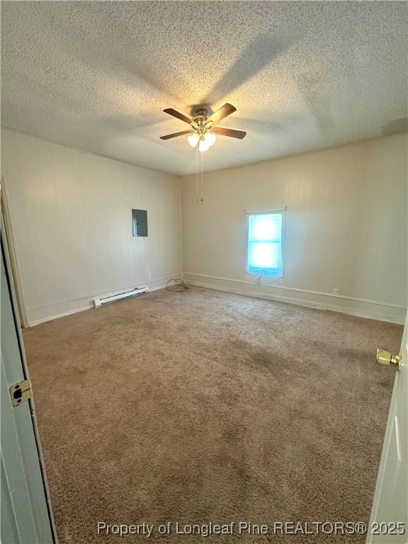400 Daniel McLeod Road Red Springs, NC 28377 - Photo 5 of 12 en empty room with windows and ceiling fan view