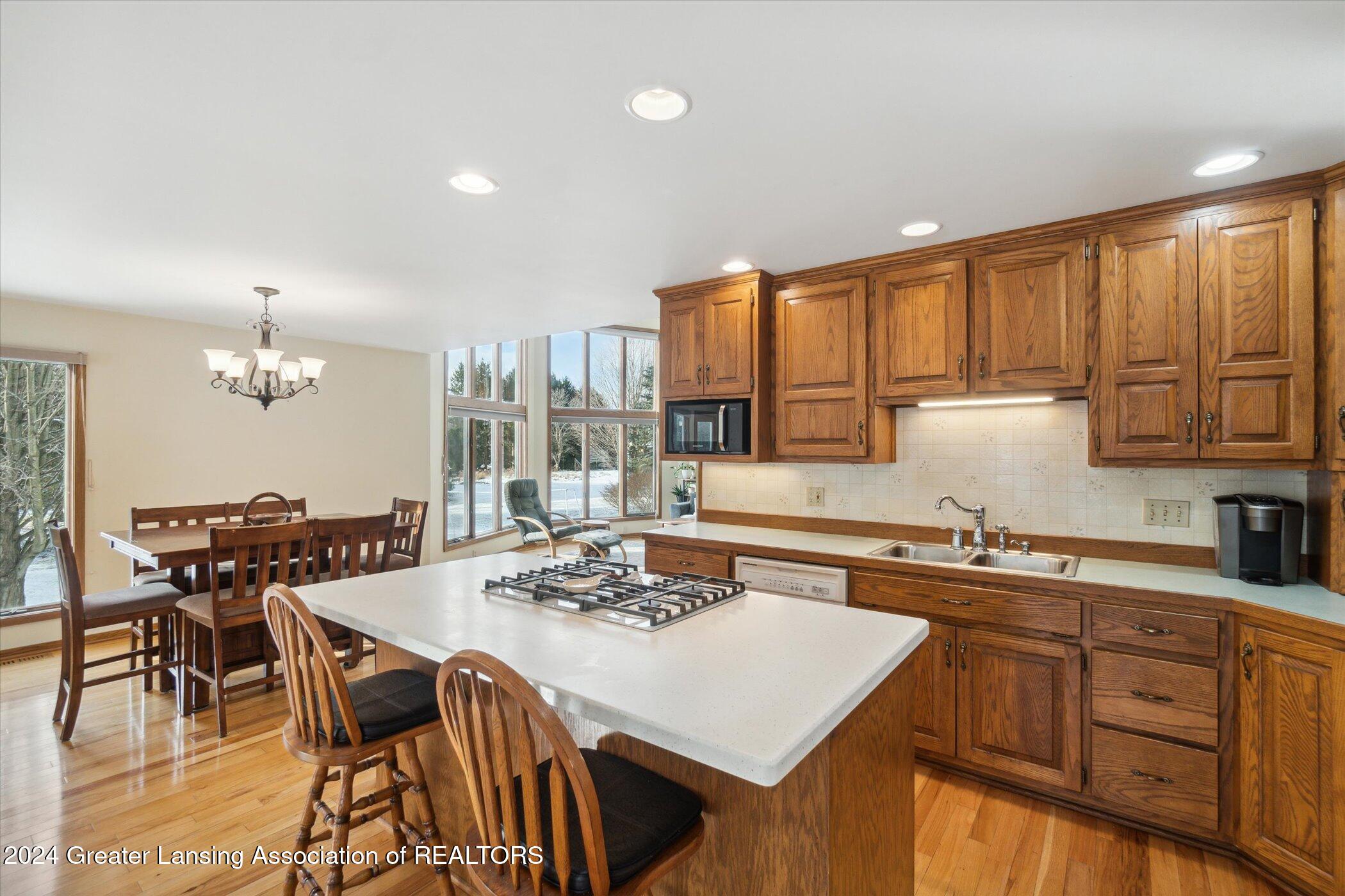 14725 Nichols Road Bath, MI 48808 - Photo 16 of 53 Island seating