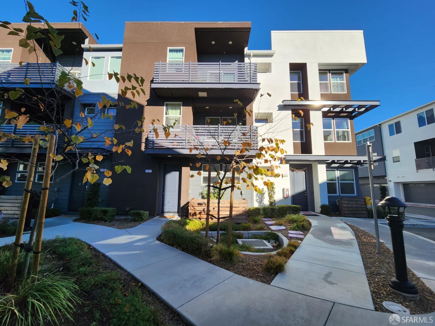 561 Clover Circle Milpitas, CA 95035 - Photo 1 of 2 a front view of a house with a garden
