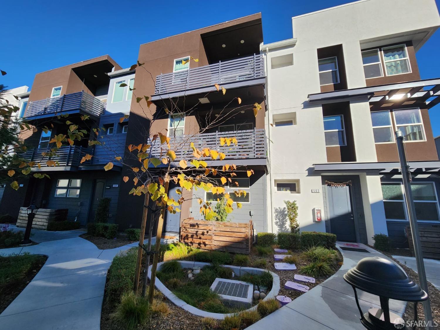 561 Clover Circle Milpitas, CA 95035 - Photo 2 of 2 a front view of a house with parking space