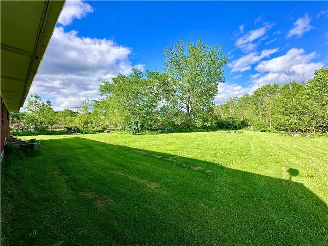 a view of building with yard