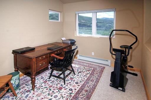 11 Hackamore Road, Unit B Edwards, CO 81632 - Photo 11 of 20 a room with gym equipment and a window