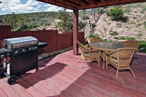 11 Hackamore Road, Unit B Edwards, CO 81632 - Photo 19 of 20 a patio with glass top table and chairs