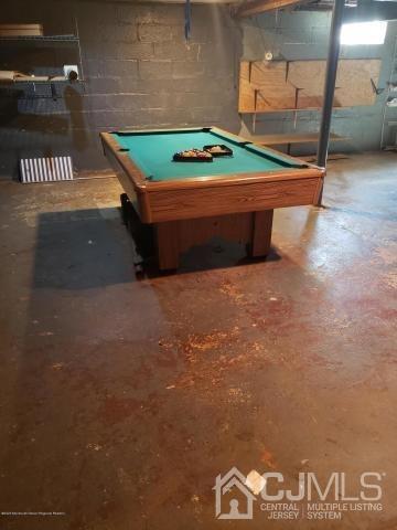 16 Rodney Road East Brunswick, NJ 08816 - Photo 8 of 12 a room with pool table and window