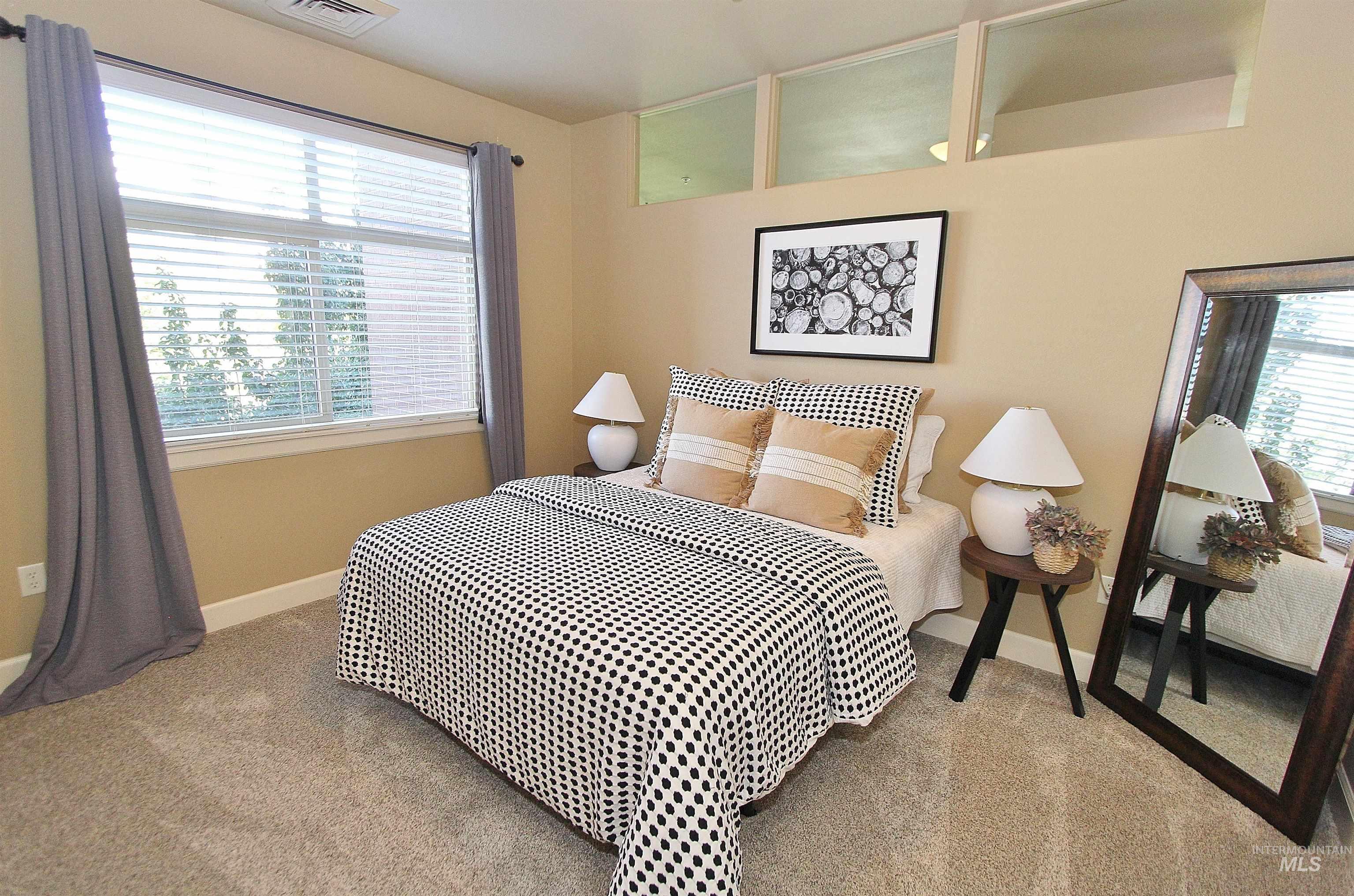 406 South 13th Street, Unit 303 Boise, ID 83702 - Photo 11 of 18 Bedroom with light carpet