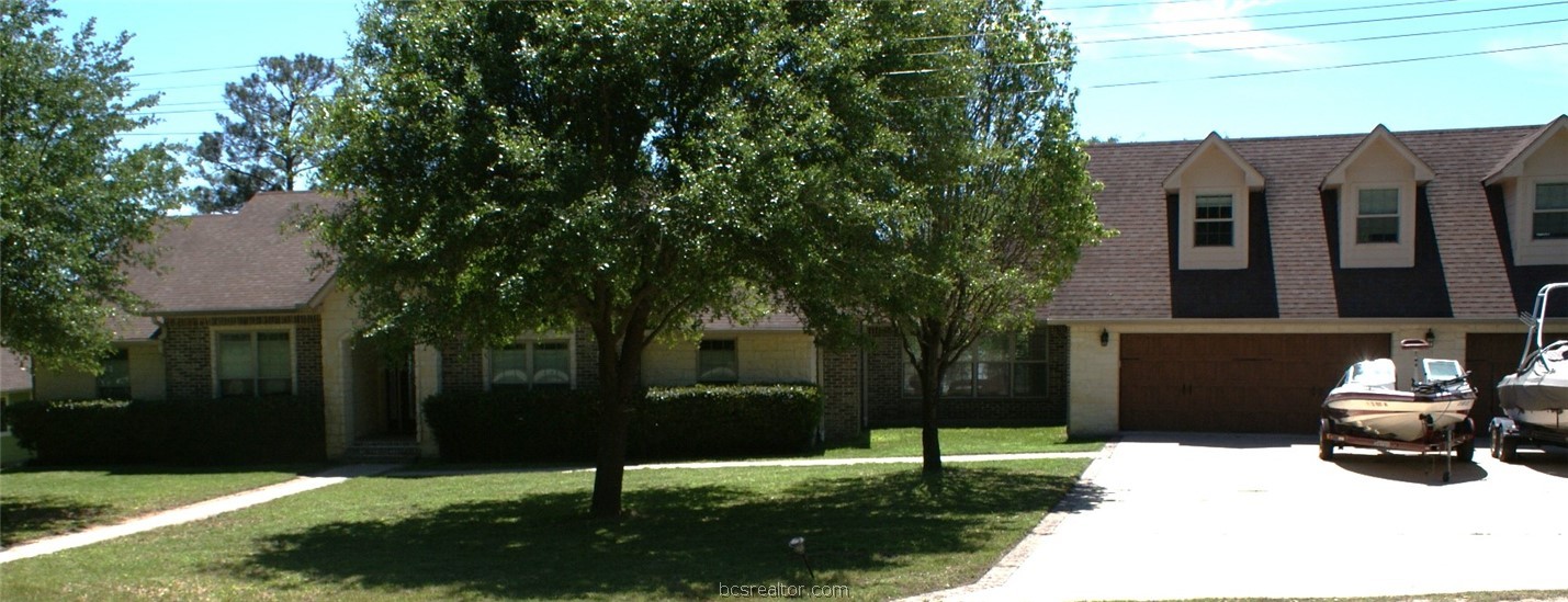 259 Memphis Bell Lane Trinity, TX 75862 - Photo 2 of 50 a backyard of a house with lots of green space