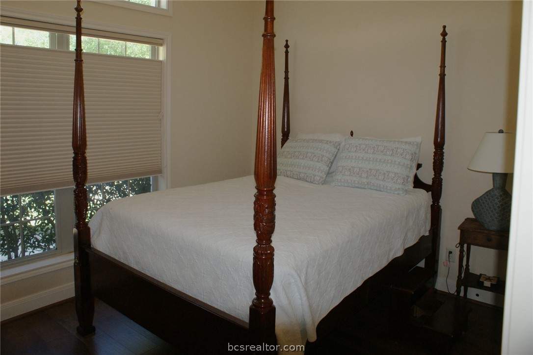 259 Memphis Bell Lane Trinity, TX 75862 - Photo 23 of 50 a bed sitting in a bedroom next to a window