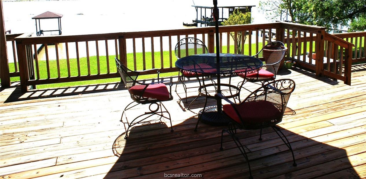 259 Memphis Bell Lane Trinity, TX 75862 - Photo 49 of 50 a view of a two chairs on the roof deck