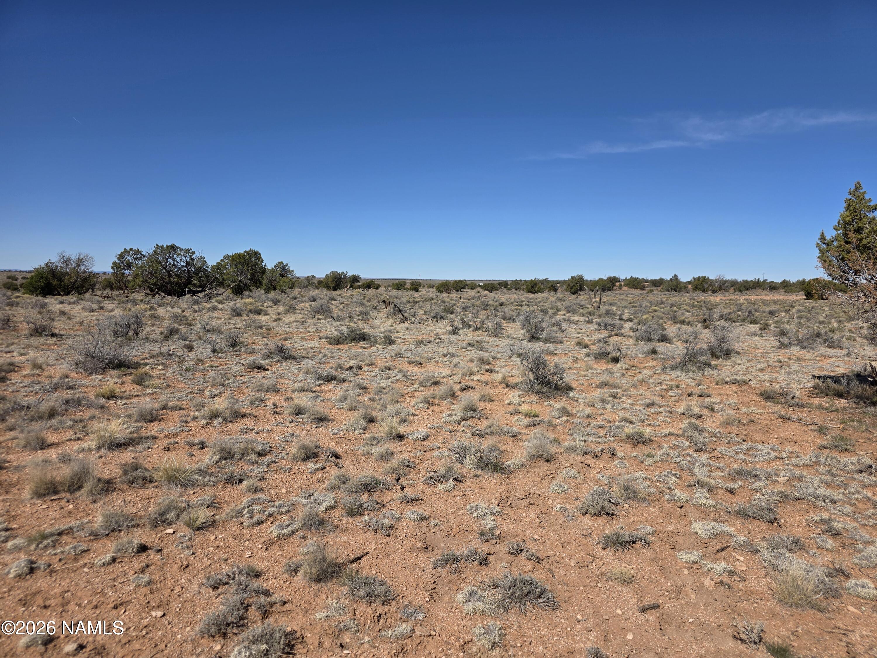 1153 East Indian Meadows Road Williams, AZ 86046 - Photo 21 of 34 a view of a field with an outdoor space