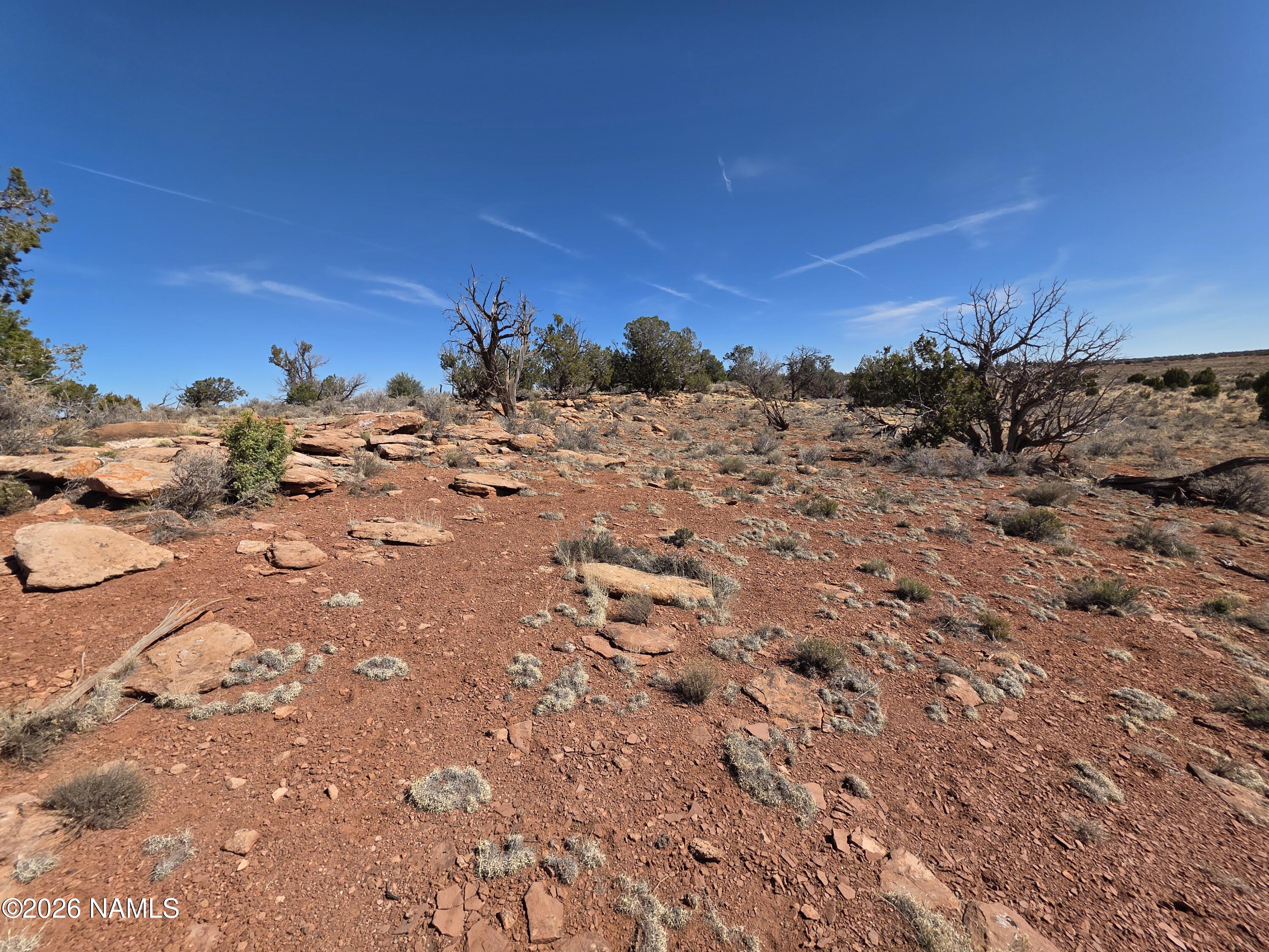 1153 East Indian Meadows Road Williams, AZ 86046 - Photo 6 of 34 a view of a large building with a mountain in the background