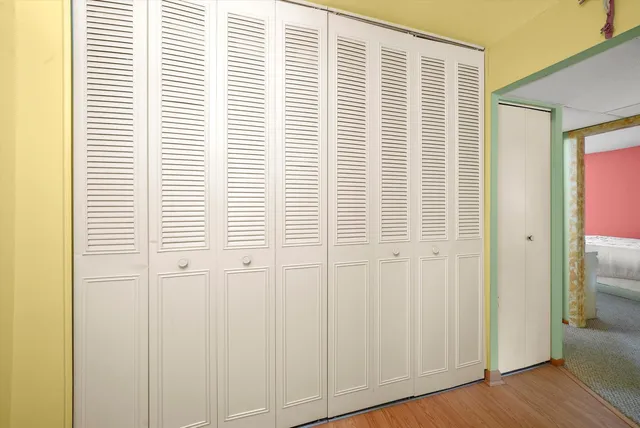 a view of a bedroom with a window