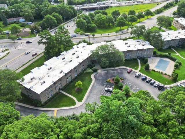 an aerial view of a house with a garden