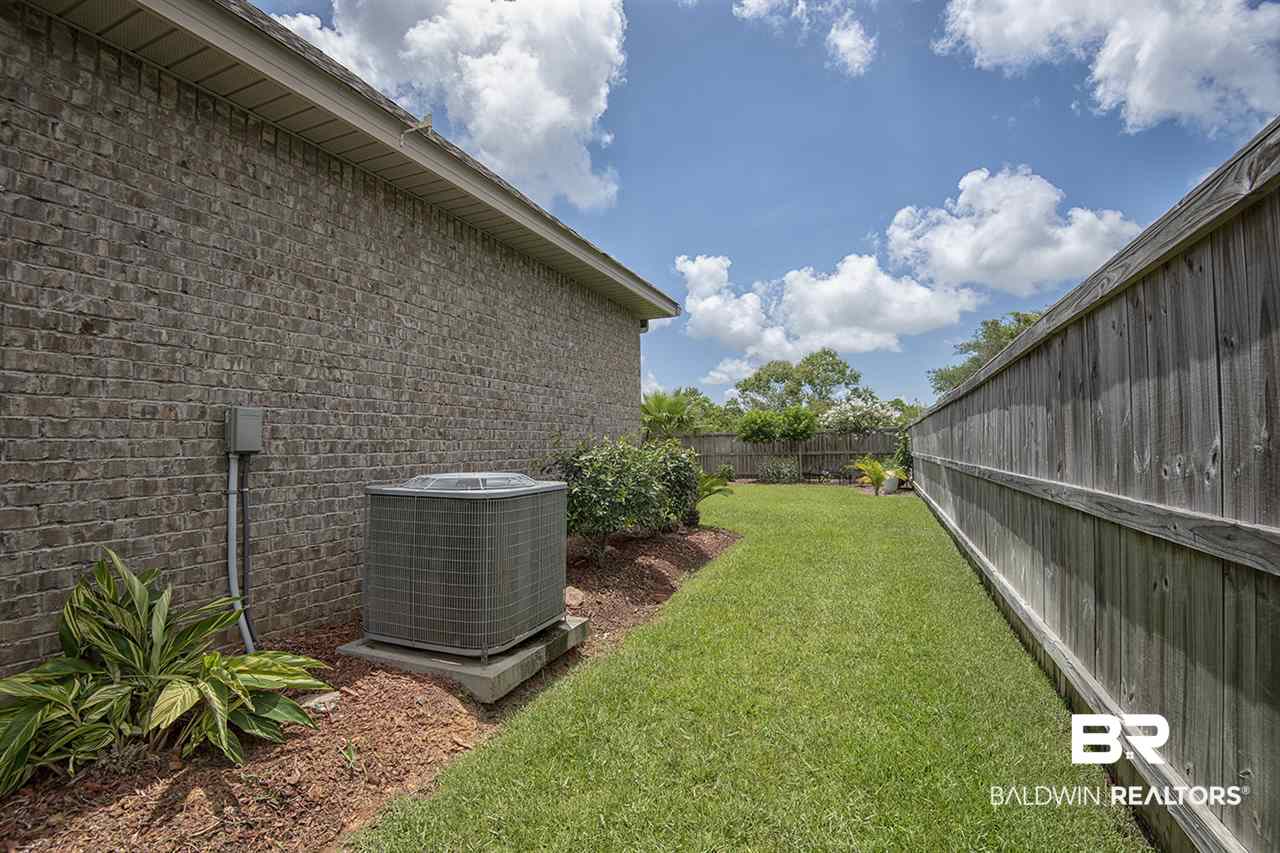 7023 Rocky Rd Loop Gulf Shores, AL 36542 - Photo 7 of 34 Side Yard