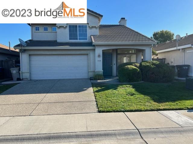 5408 Buckwood Way Sacramento, CA 95835 - Photo 1 of 1 a front view of a house with garden