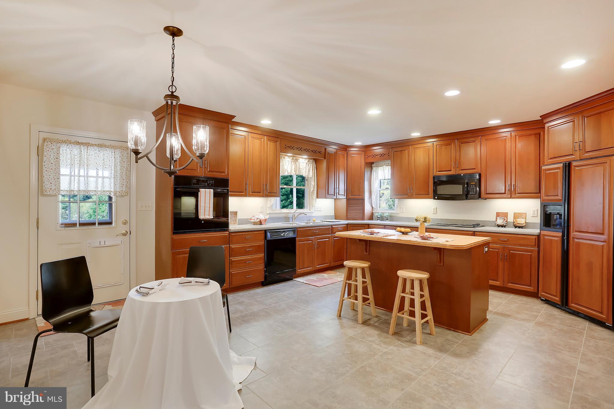 24500 Stringtown Road Clarksburg, MD 20871 - Photo 11 of 30 CHERRYWOOD CABNETRY & SEPARATE BREAKFAST AREA