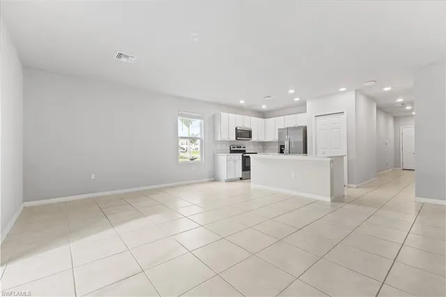 a view of a kitchen with a sink