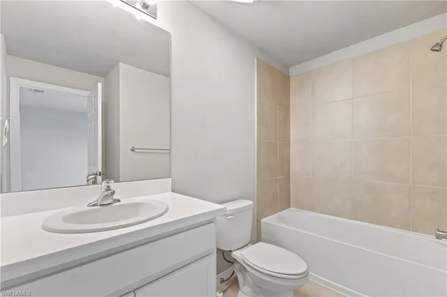 a bathroom with a sink toilet and a bathtub