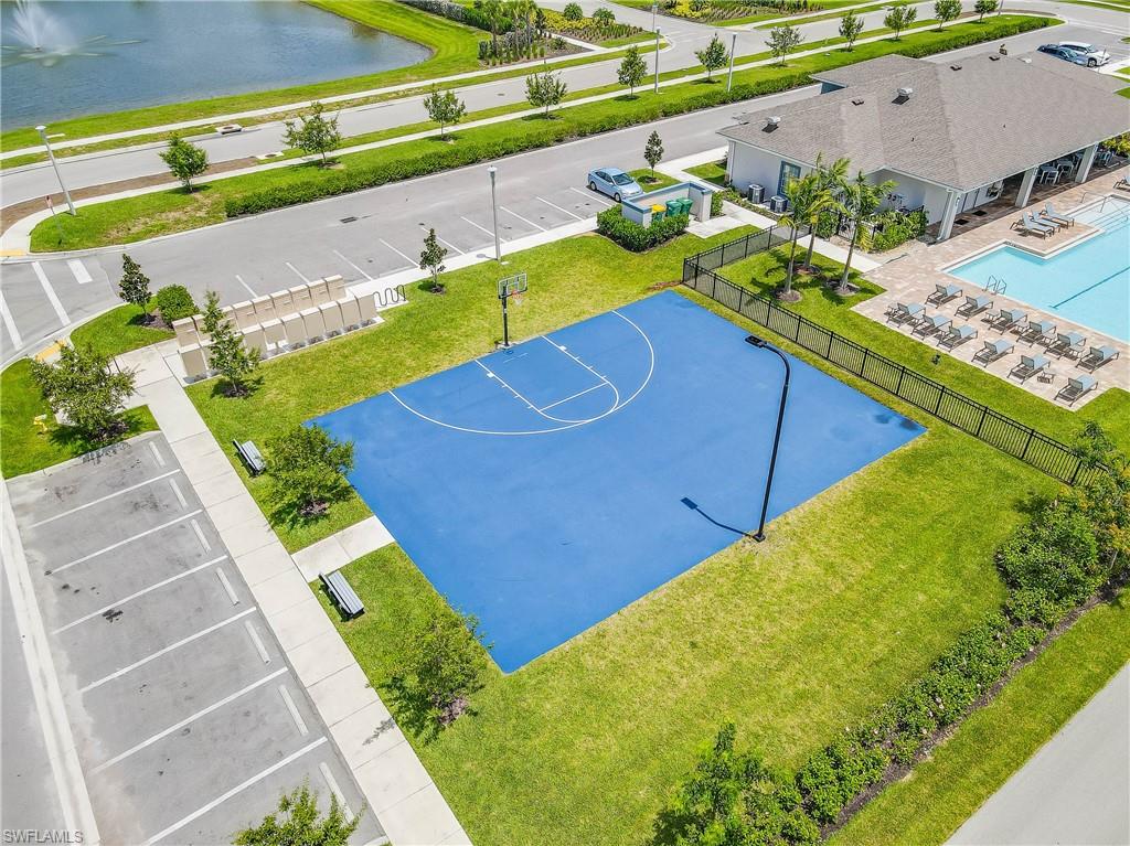 15245 Wildflower Circle Naples, FL 34119 - Photo 31 of 36 a view of a backyard with plants