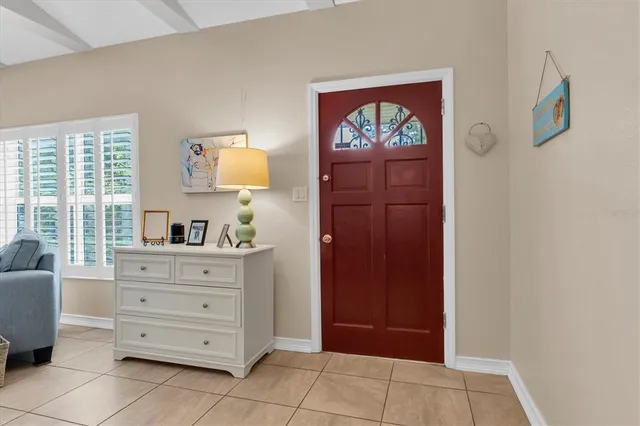 a view of a park with sign board and garden