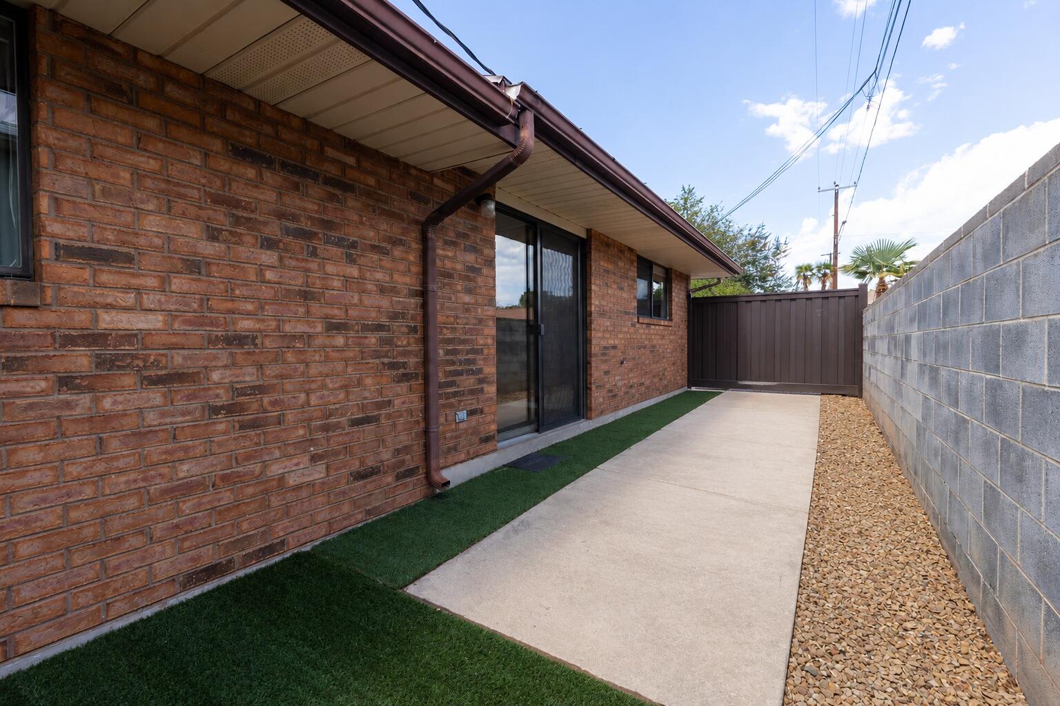 55 West 400th Street South, Unit 15 St. George, UT 84770 - Photo 12 of 16 Sun town backyard